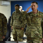 US SOUTHCOM Air Force chief, Major General Evan Pettus (saluting) during his time at a US military base in Saudi Arabia, June 2020. Photo: Facebook/378th Air Expeditionary Wing.