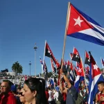 Tens of thousands of people participate in the parade for International Workers' Day on Monday, May 1, 2017, in the Plaza de la Revolución in Havana, Cuba. Photo: Alejandro Ernesto/EFE.