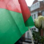 Palestinian flag and a flower. Photo: Ehimetalor Akhere Unuabona.