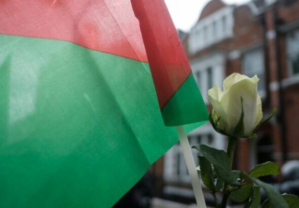 Palestinian flag and a flower. Photo: Ehimetalor Akhere Unuabona.