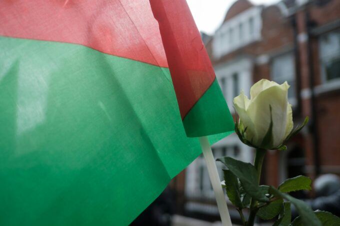 Palestinian flag and a flower. Photo: Ehimetalor Akhere Unuabona.