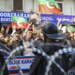 Supporters of former Prime Minister Imran Khan’s Pakistan Tehreek-e-Insaf (PTI) protest against the alleged skewing in Pakistan's national election results, in Karachi on February 11, 2024. Photo by AFP.