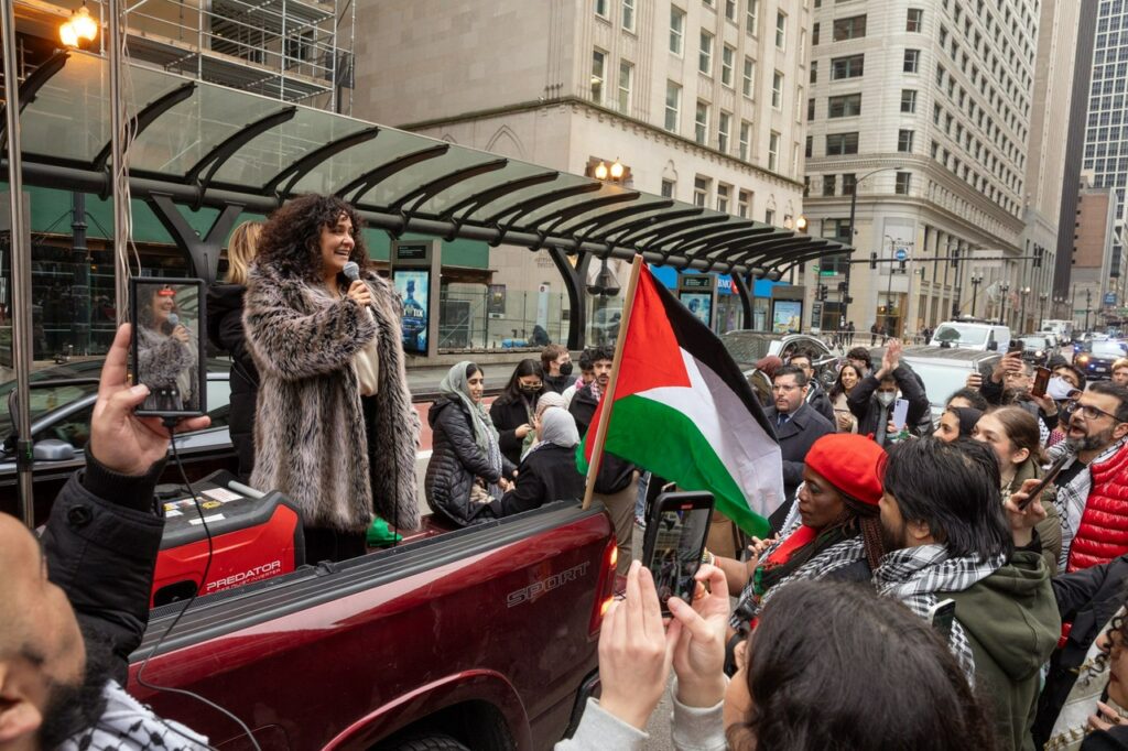 Chicago Alderwoman Rossana Rodriguez-Sanchez speaking to the rally following the passage of her Palestine resolution. Photo: Fight Back! News/Alec Ozawa.