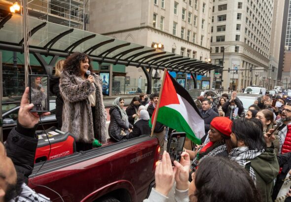 Chicago Alderwoman Rossana Rodriguez-Sanchez speaking to the rally following the passage of her Palestine resolution. Photo: Fight Back! News/Alec Ozawa.