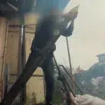 A fighter from Hamas al-Qassam Brigades drops a 120mm mortar shell to fire at gropings of Israeli troops to the southeast of al-Zaytoun, Gaza City, the Gaza Strip, this footage was published on February 28, 2024. Photo: Al-Qassam Brigades/Military Media.