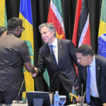 US Secretary of State Anthony Blinken thanking Guyanese President Irfaan Ali for a job well-done in fronting for the US-orchestrated “transitional presidential council” (CPT) in Haiti. Photo: Haïti Liberté.