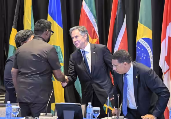 US Secretary of State Anthony Blinken thanking Guyanese President Irfaan Ali for a job well-done in fronting for the US-orchestrated “transitional presidential council” (CPT) in Haiti. Photo: Haïti Liberté.