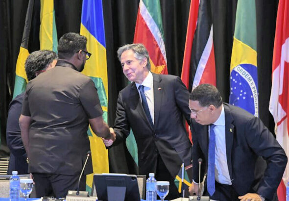 US Secretary of State Anthony Blinken thanking Guyanese President Irfaan Ali for a job well-done in fronting for the US-orchestrated “transitional presidential council” (CPT) in Haiti. Photo: Haïti Liberté.