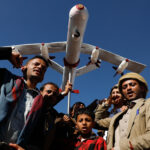 Feature photo | Supporters of Ansar Allah hold a mock drone drone during a rally against the U.S.-led strikes on Yemen and Israel’s war in Gaza Strip, in Sanaa, Yemen, Feb. 23, 2024. Photo: Osamah Abdulrahman/AP.