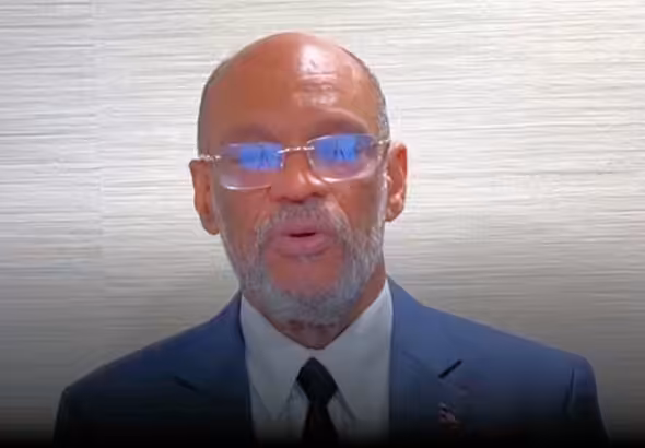 Haitian de facto Prime Minister Ariel Henry speaking from Puerto Rico on March 12 to announce that he will resign when a new Haitian government is installed. Photo: YouTube screenshot of Henry's speech.