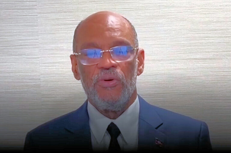 Haitian de facto Prime Minister Ariel Henry speaking from Puerto Rico on March 12 to announce that he will resign when a new Haitian government is installed. Photo: YouTube screenshot of Henry's speech.
