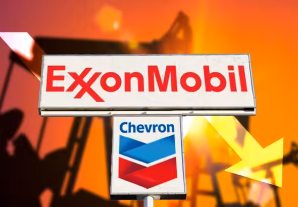 Hoardings showing the names and logos of ExxonMobil and Chevron in the backdrop of a silhouette of oil extraction machinery. Photo: El CEO.