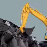 A bulldozer destroying a building. Photo. NewsClick/File Photo.