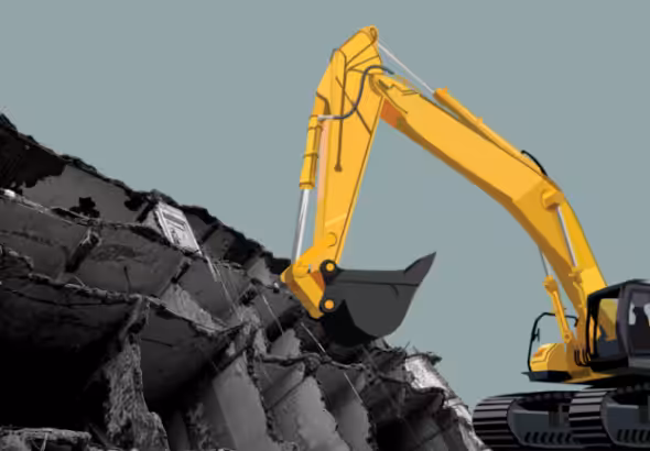 A bulldozer destroying a building. Photo. NewsClick/File Photo.