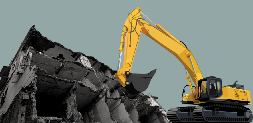 A bulldozer destroying a building. Photo. NewsClick/File Photo.