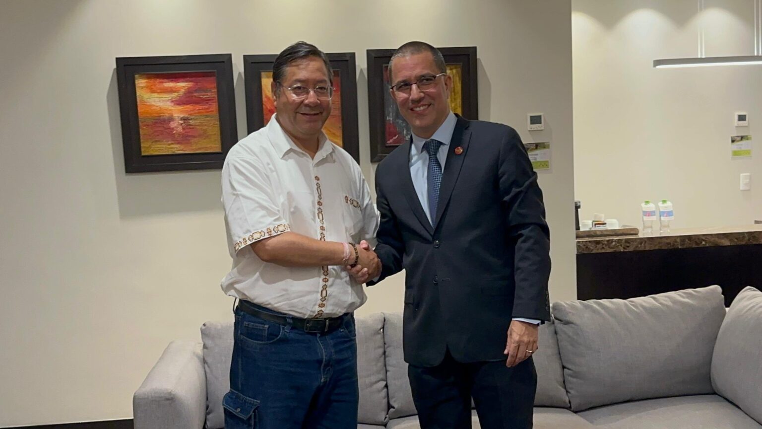 Bolivian President Luis Arce (left) shaking hands with Executive Secretary of ALBA-TCP Jorge Arreaza (right). Photo: X/@ALBATCP.