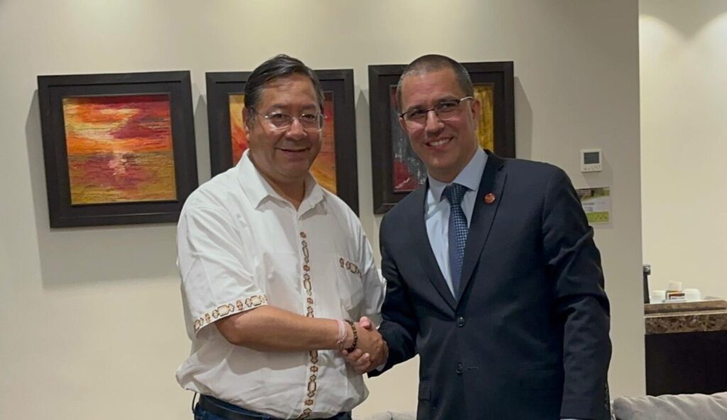 Bolivian President Luis Arce (left) shaking hands with Executive Secretary of ALBA-TCP Jorge Arreaza (right). Photo: X/@ALBATCP.