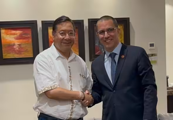 Bolivian President Luis Arce (left) shaking hands with Executive Secretary of ALBA-TCP Jorge Arreaza (right). Photo: X/@ALBATCP.