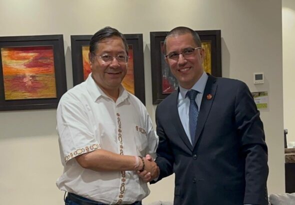 Bolivian President Luis Arce (left) shaking hands with Executive Secretary of ALBA-TCP Jorge Arreaza (right). Photo: X/@ALBATCP.