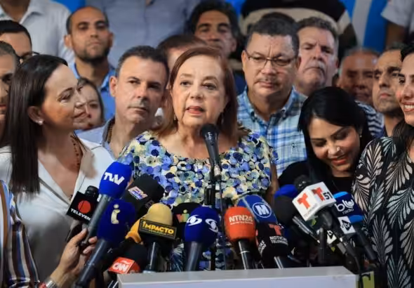 New Unitary Platform candidate Corina Yoris giving a speech after the announcement of her selection as presidential candidate. Photo: Federico Parra/AFP.