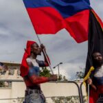 Demonstrators protest in front of the US Embassy in Haiti. Photo: AFP.