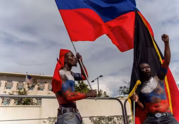 Demonstrators protest in front of the US Embassy in Haiti. Photo: AFP.