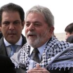 Brazilian President Luiz Inácio Lula da Silva wears a Palestinian kaffiyeh in the West Bank city of Ramallah on 17 March 2010. Photo: AFP/File photo.