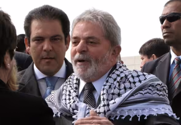 Brazilian President Luiz Inácio Lula da Silva wears a Palestinian kaffiyeh in the West Bank city of Ramallah on 17 March 2010. Photo: AFP/File photo.