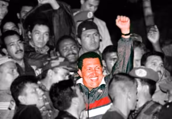 Iconic photo, in black and white format with colorized Venezuelan President Hugo Chávez after returning to Miraflores Palace in the aftermath of the failed far-right coup launched by US-backed opposition forces. Photo: El Perro y la Rana/File photo.