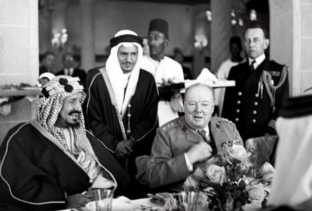 Winston Churchill sits with King Abdulaziz Ibn Saud of Saudi Arabia during lunch at Auberge due Lac, Fayoum, in February 1945. Photo: AP/File photo. 