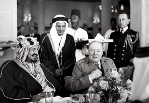 Winston Churchill sits with King Abdulaziz Ibn Saud of Saudi Arabia during lunch at Auberge due Lac, Fayoum, in February 1945. Photo: AP/File photo. 