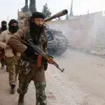 ISIS militants in Syria. Photo: Hosam Katan/Reuters.