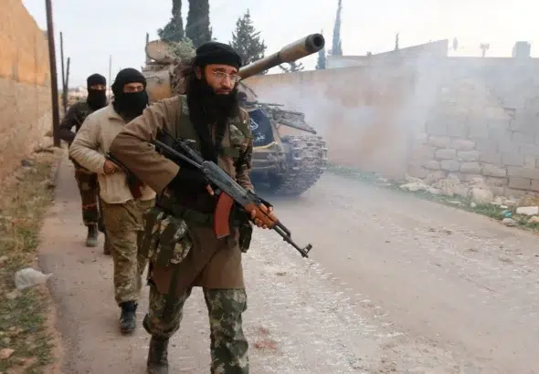 ISIS militants in Syria. Photo: Hosam Katan/Reuters.