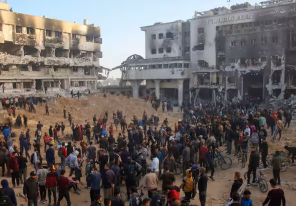 Palestinians inspect the damage at Gaza's al-Shifa hospital after the Israeli military withdrew from the complex housing the hospital on April 1, 2024. Photo: AFP