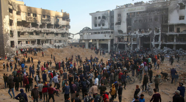 Palestinians inspect the damage at Gaza's al-Shifa hospital after the Israeli military withdrew from the complex housing the hospital on April 1, 2024. Photo: AFP