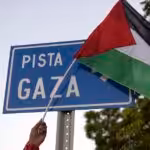 A man holds a Palestinian flag during the inauguration of Gaza street in support of the Palestinian people, in the historic center of Managua, Nicaragua, on January 30, 2024. Photo: AFP.