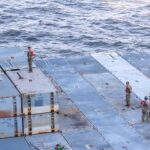 US Army soldiers prepare mobile causeway sections to be loaded aboard MV Roy A. Benavidez on March 15, 2024. Photo: USNI News.