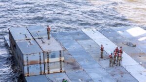US Army soldiers prepare mobile causeway sections to be loaded aboard MV Roy A. Benavidez on March 15, 2024. Photo: USNI News.
