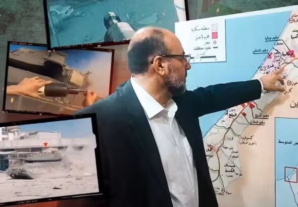 Ali Baraka, head of Hamas' Foreign Relations Department pointing at an are in besieged Gaza. Photo: Hawraa Ali/Al Mayadeen Net.