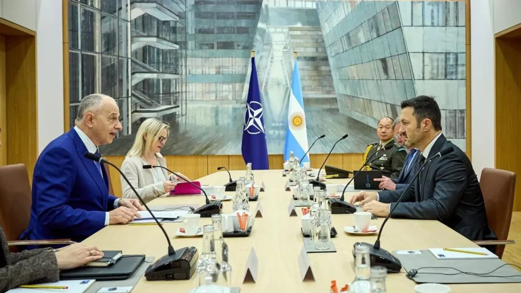 Argentinian Defense Minister Luis Petri (right) meets with NATO Deputy Secretary General Mircea Geoana (left) to submit Argentina's application to become a NATO global partner, in Brussels, Belgium, April 18, 2024. Photo: NATO.