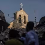 Civilians inspect the damage inflicted on the Greek Orthodox Church of Saint Porphyrius, the third oldest church in the world, which was bombed by the Israeli occupation in Gaza. Photo: X/@pmofa.