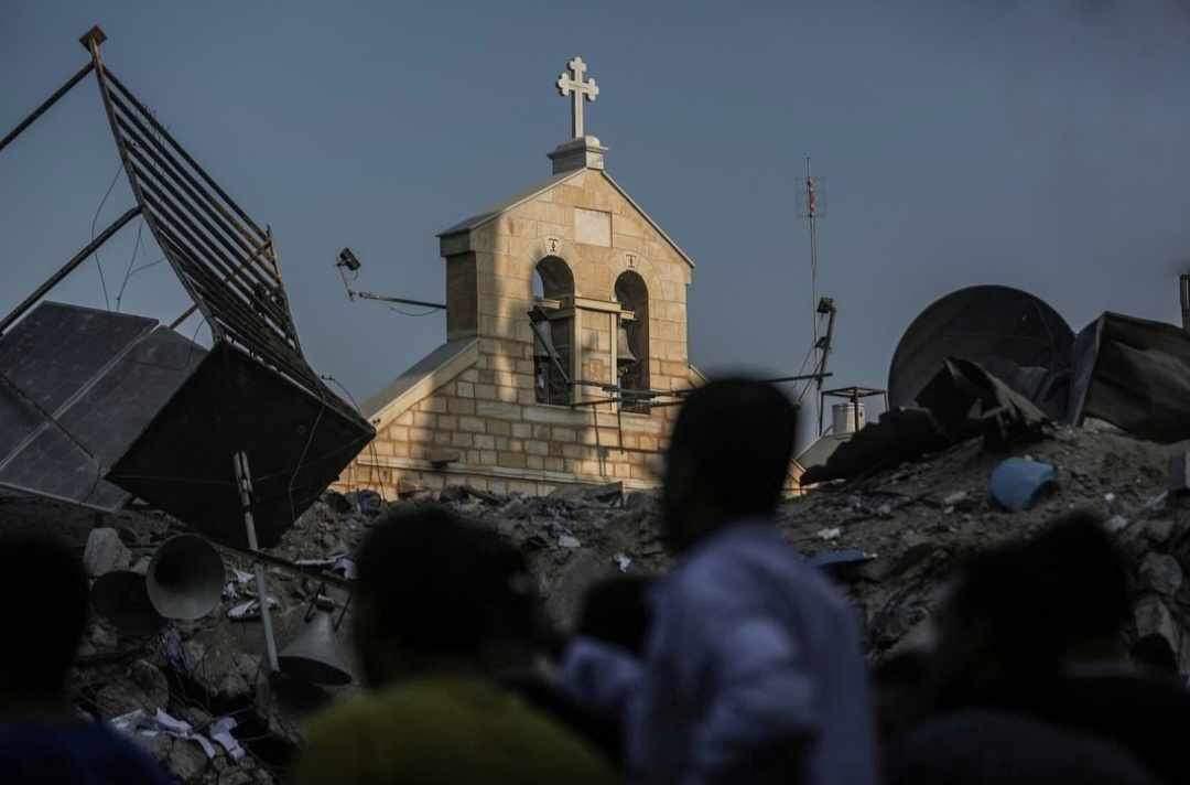 Civilians inspect the damage inflicted on the Greek Orthodox Church of Saint Porphyrius, the third oldest church in the world, which was bombed by the Israeli occupation in Gaza. Photo: X/@pmofa.