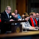 Carlos Argüello, Nicaragua’s Ambassador to the Netherlands and Advisor to Nicaragua’s Foreign Ministry on International Law, explains that the object of Nicaragua’s suit against Germany is to create a precedent with wider application – that countries must take responsibility for the consequences of their arms sales. Photo: Changing Times.