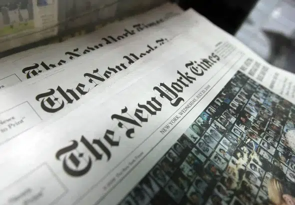 Copies of the New York Times in a newsstand. Photo by Mario Tama/Getty Images.