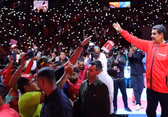 Venezuelan President Nicolás Maduro greets supporters at a rally of the United Socialist Party of Venezuela (PSUV). File photo.