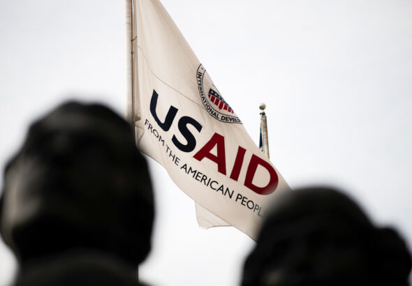 USAID flag flies in front of the USAID headquarters in Washington, DC, as seen on September 10, 2019. Photo: Graeme Sloan/Sipa USA.