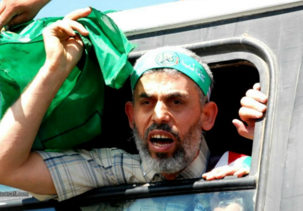 Yahya Sinwar, leader of the Hamas Islamic Resistance Movement, celebrates his freedom from occupation prisons in 2011 following a successful prisoner exchange. Photo: Khaled Safi.