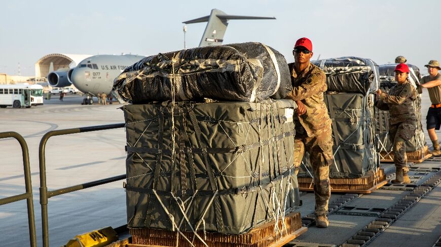 US Air Force members work on the preparation of a humanitarian aid drop for Gaza residen March 5, 2024. Photo: US Central Command/X/Handout/REUTERS/File Photo.