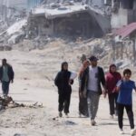Palestinians inspect destroyed residential buildings in Khan Younis after the Israeli military withdrew most of its ground troops from the southern Gaza Strip. Photo: Reuters.