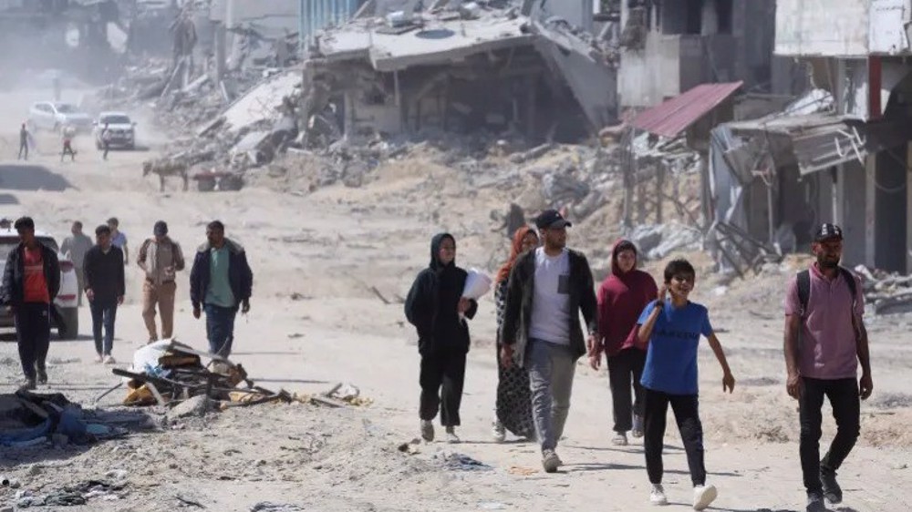 Palestinians inspect destroyed residential buildings in Khan Younis after the Israeli military withdrew most of its ground troops from the southern Gaza Strip. Photo: Reuters.